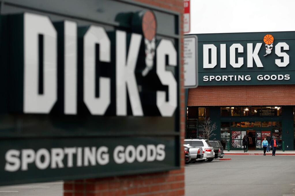 Customers arrive and depart Dick's Sporting Goods in Santa Rosa, California, on Wednesday, February 28, 2018. The sports retail chain announced today that it would no longer sell assault rifles in its stores, in addition to other self-imposed gun control measures in the wake of the Parkland, Florida school shooting. (Alvin Jornada / The Press Democrat)