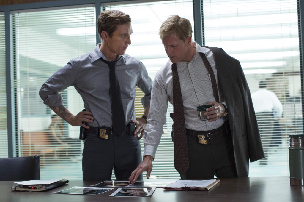 This image released by HBO shows Matthew McConaughey, left, and Woody Harrelson from the HBO series 'True Detective.' Both Harrelson and McConaughey were nominated for Emmy Awards for best actor in a drama series for their roles in the series. The 66th Primetime Emmy Awards will be presented Aug. 25 at the Nokia Theatre in Los Angeles. (AP Photo/HBO, Michele K. Short)