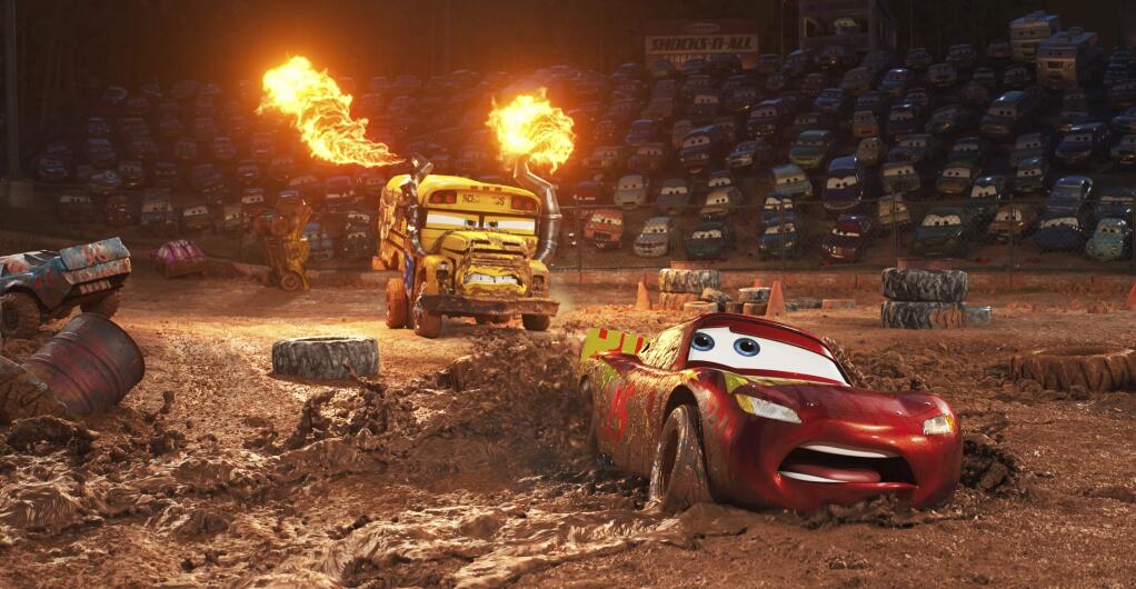 This image released by Disney shows Lightning McQueen, voiced by Owen Wilson, foreground, in a scene from 'Cars 3.' (Disney-Pixar via AP)