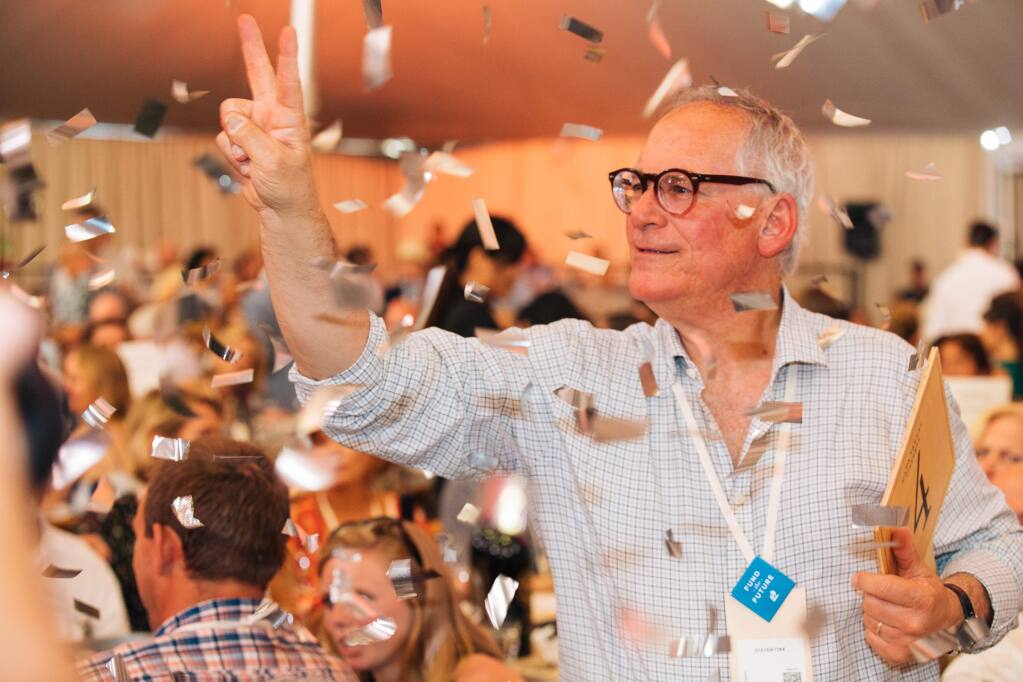 A winning bidder at the Auction Napa Valley 2018 live auction, held at Meadowood Napa Valley on June 2, 2018. (Alexander Rubin / for Napa Valley Vintners)