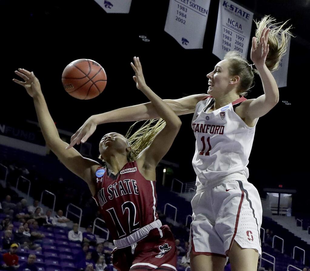 Stanford's Alana Smith (11) blocks a shot by New Mexico State's Zaire Williams (12) during the first half of a first-round game in the NCAA women's college basketball tournament Saturday, March 18, 2017, in Manhattan, Kan. (AP Photo/Charlie Riedel)