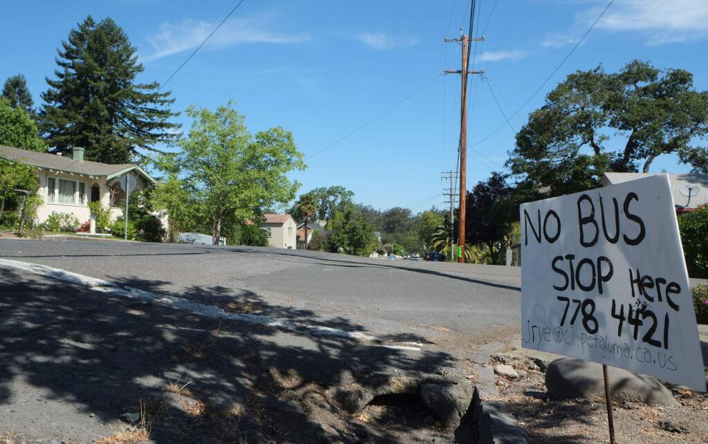 A sign at the corner of Keokuk and West streets is one of several in the area on June 3, 2016 protesting a proposal to route a Petaluma Transit bus through the area (Eric Gneckow/Argus-Courier staff).