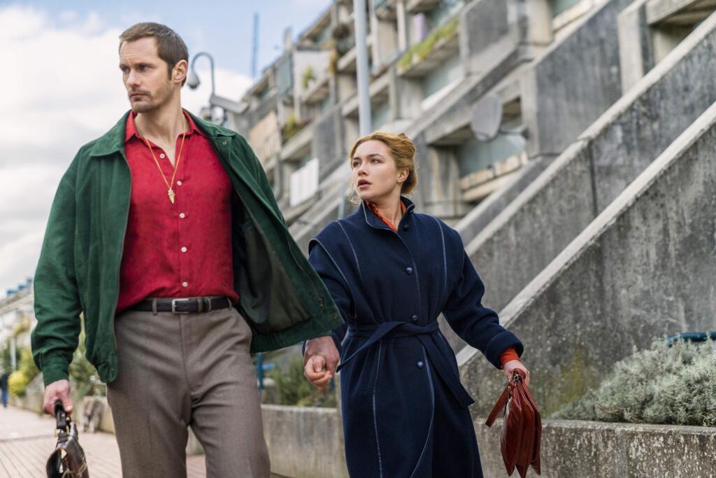 This image released by AMC shows Alexander Skarsgard, left, and Florence Pugh in a scene from the series 'The Little Drummer Girl,' premiering on Nov. 19. (Jonathan Olley/AMC/Ink Factory via AP)