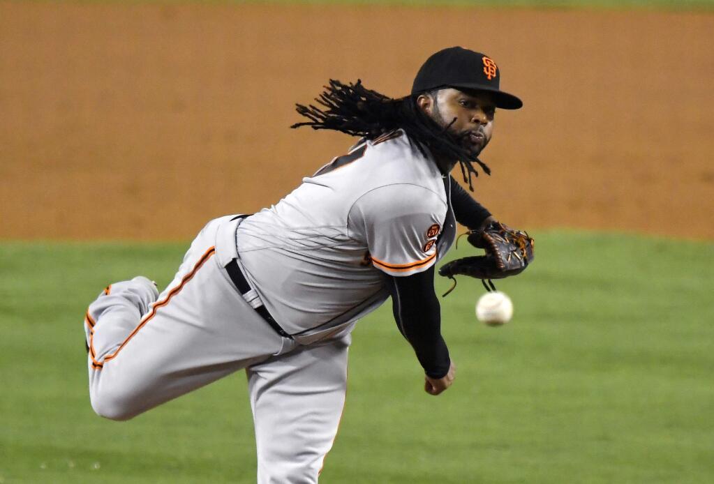San Francisco Giants starting pitcher Johnny Cueto throws to the plate during the second inning of a baseball game against the Los Angeles Dodgers, Tuesday, Sept. 20, 2016, in Los Angeles. (AP Photo/Mark J. Terrill)