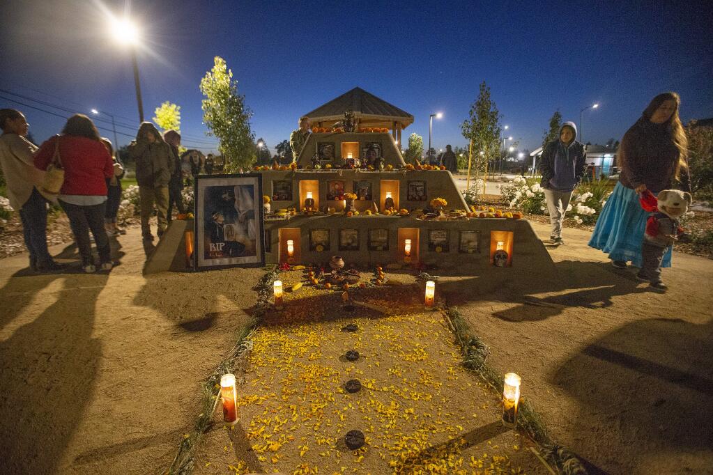 Community members gather for a vigil at Andy's Unity Park in Santa Rosa to commemorate the 5-year anniversary of Andy Lopez's death on Monday, Oct. 22, 2018. (JOHN BURGESS/ PD)