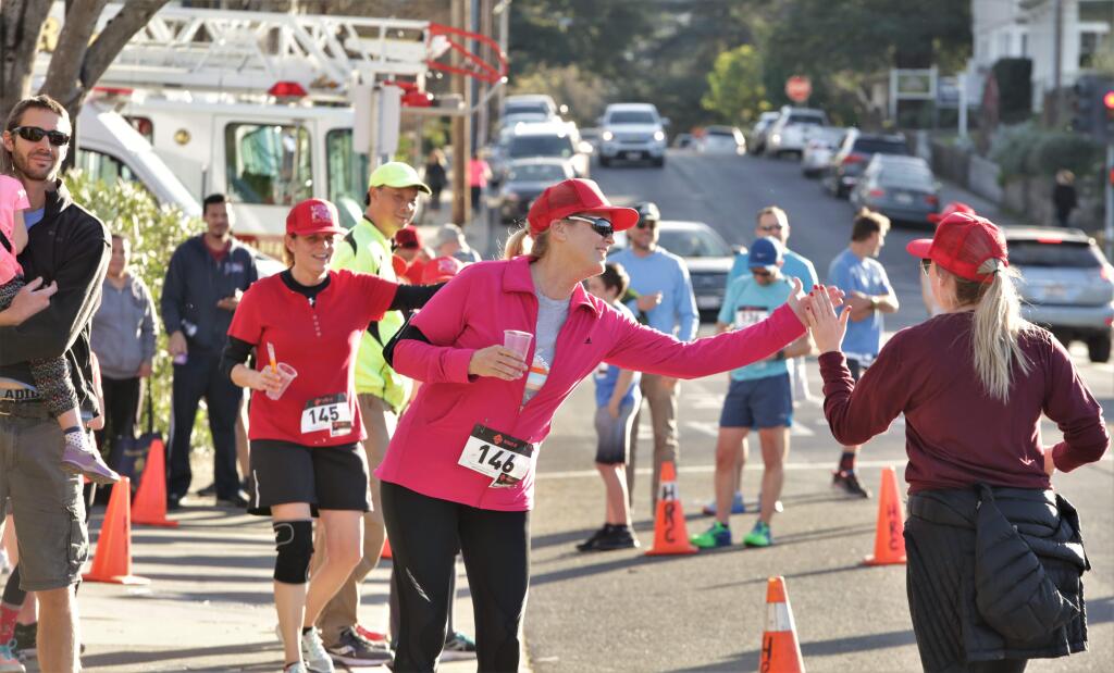 Hundreds of runners came to Healdsburg Saturday, February 10th, 2018 to participate in the 'Love Run for Drew'. The 5K run, organized by the Healdsburg Running Company benefits the Drew Esquivel Memorial Scholarship which helps kids attend college. (Photos Will Bucquoy/for the Press Democrat)
