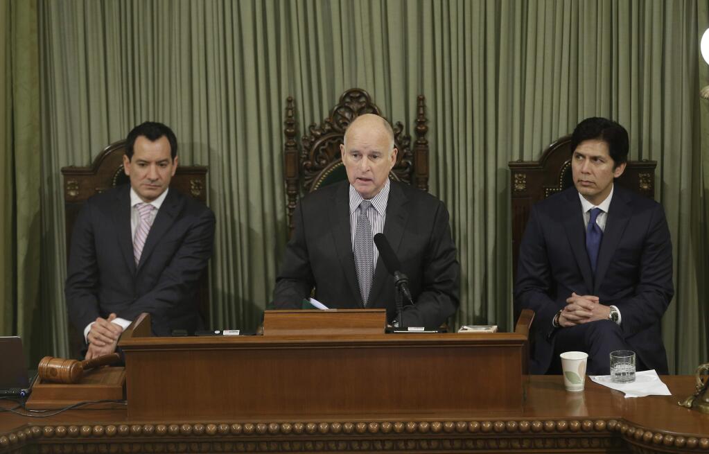California Gov. Jerry Brown delivers his annual State of the State address before a joint session of the California Legislature Tuesday, Jan. 24, 2017, in Sacramento, Calif. In the background are Assembly Speaker Anthony Rendon, D-Paramount, left, and Senate President Pro Tem Kevin de Leon, D-Los Angeles. (AP Photo/Rich Pedroncelli)