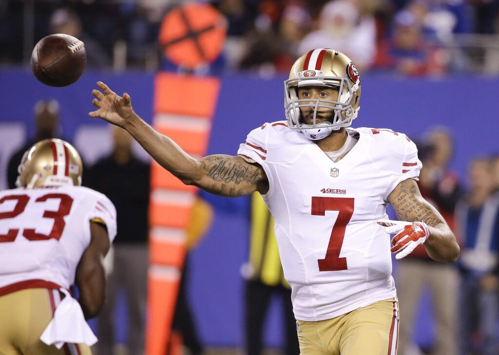San Francisco 49ers quarterback Colin Kaepernick (7) throws a pass against the New York Giants during the first quarter of an NFL football game, Sunday, Oct. 11, 2015, in East Rutherford, N.J. (AP Photo/Seth Wenig)