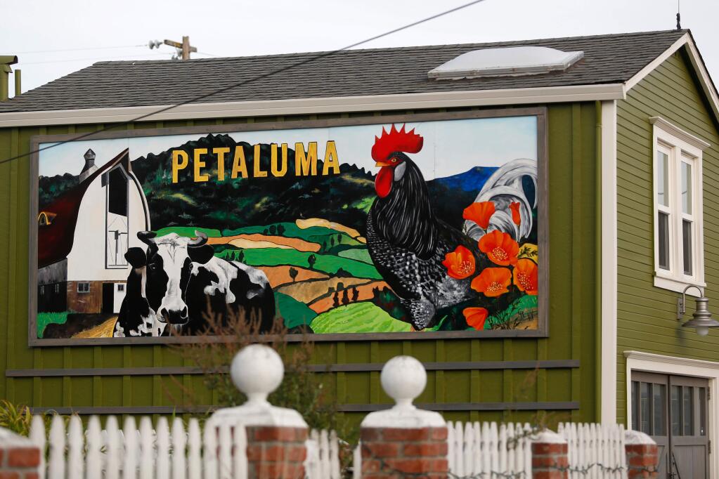 The garage mural at the home of Caroline Hall and Brad Villegiante, one of the winners of the bi-annual Heritage Homes of Petaluma Historic Preservation awards, in Petaluma, California on Wednesday, October 7, 2015. (Alvin Jornada / The Press Democrat)