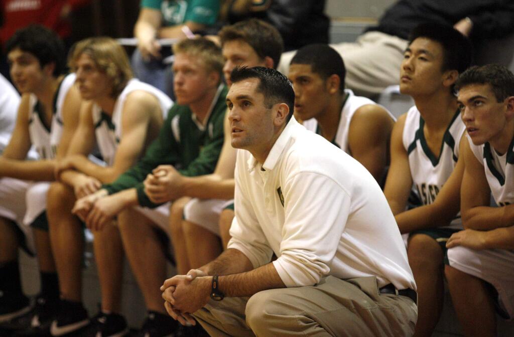 Casa coach James Forni watches with the bench as Casa went on to beat Campolindo 53-51 during the Russ Peterich Classic held at Montgomery High School. Forni passed away Sunday, June 28, 2015 after a long battle with melanoma. (PD FILE)