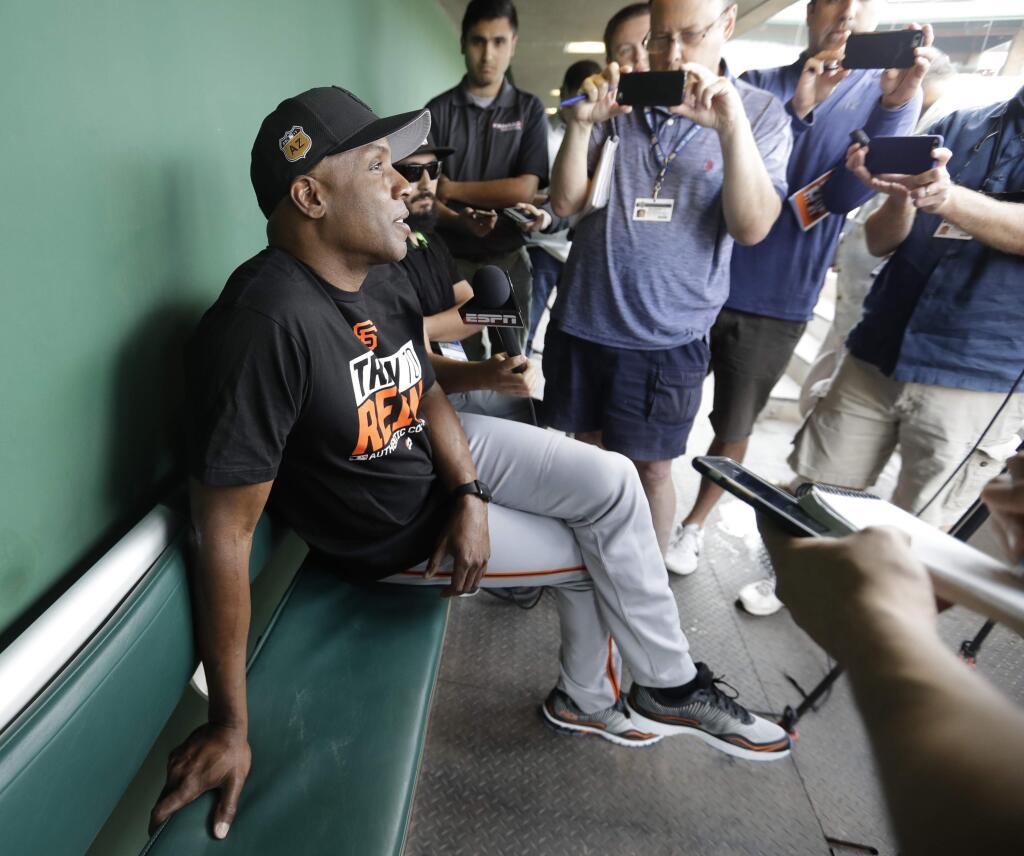 Barry Bonds responds to a question during a news conference Wednesday, March 22, 2017, in Scottsdale, Ariz. Bonds has joined the San Francisco Giants front office as a special adviser. (AP Photo/Darron Cummings)