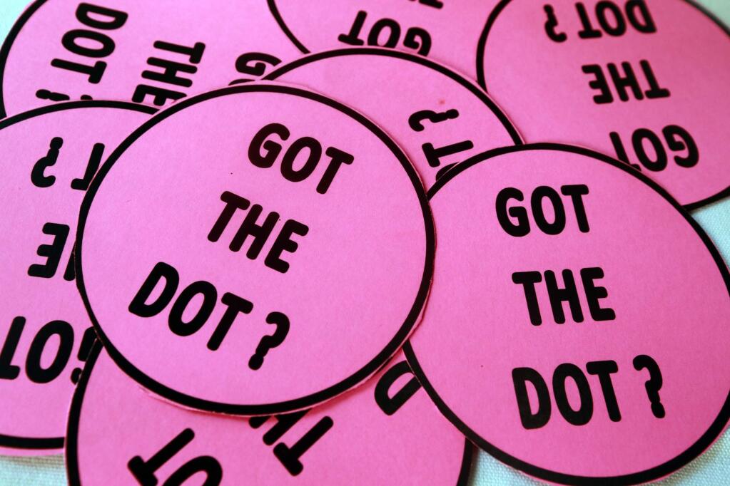 Marcie Waldron, a kidney and pancreas transplant recipient, talks to the Sonoma Kiwanis Club about her pink dot campaign. The pink dots on your driver's license indicates your wish to be an organ donor. (Photo by John Burgess/The Press Democrat)