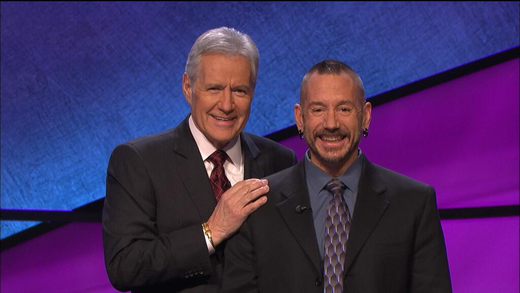 Nic Pereira (right) of Guerneville stands with Jeopardy! host Alex Trebek in a promotional photo for his appearance on the game show, Friday, March 6. (Photo Courtesy: Jeopardy Productions, Inc.)