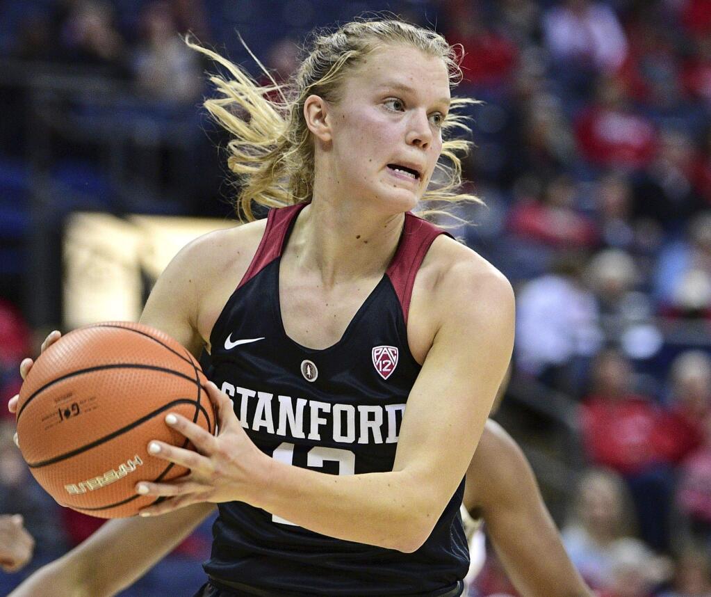 Stanford's Brittany McPhee rebounds during the second quarter against Connecticut, Sunday, Nov. 12, 2017, in Columbus, Ohio. Connecticut won 78-53. (AP Photo/David Dermer)