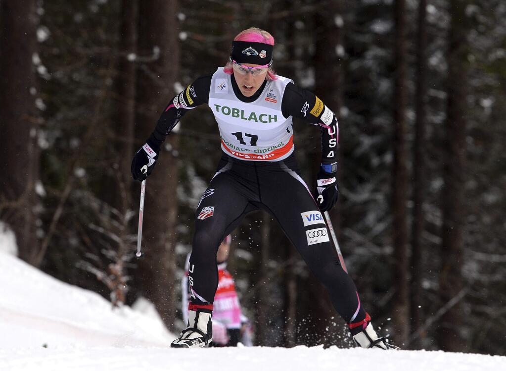 FILE - This Feb. 2, 2014, file photo shows cross country skier Kikkan Randall competing during a cross country women's World Cup sprint qualification, in Dobbiaco, Italy. Randall, a gold medalist at the 2018 Olympic Winter Games, has been diagnosed with breast cancer and began chemotherapy Monday, July 9, 2018, in her hometown of Anchorage, Alaska. Randall told The Associated Press she had her first round of chemo Monday in Anchorage, Alaska, her hometown before she moved earlier this year to Penticton, British Columbia, with her 2-year-son, Breck, and husband Jeff Ellis. (AP Photo/Elvis Piazzi, File)