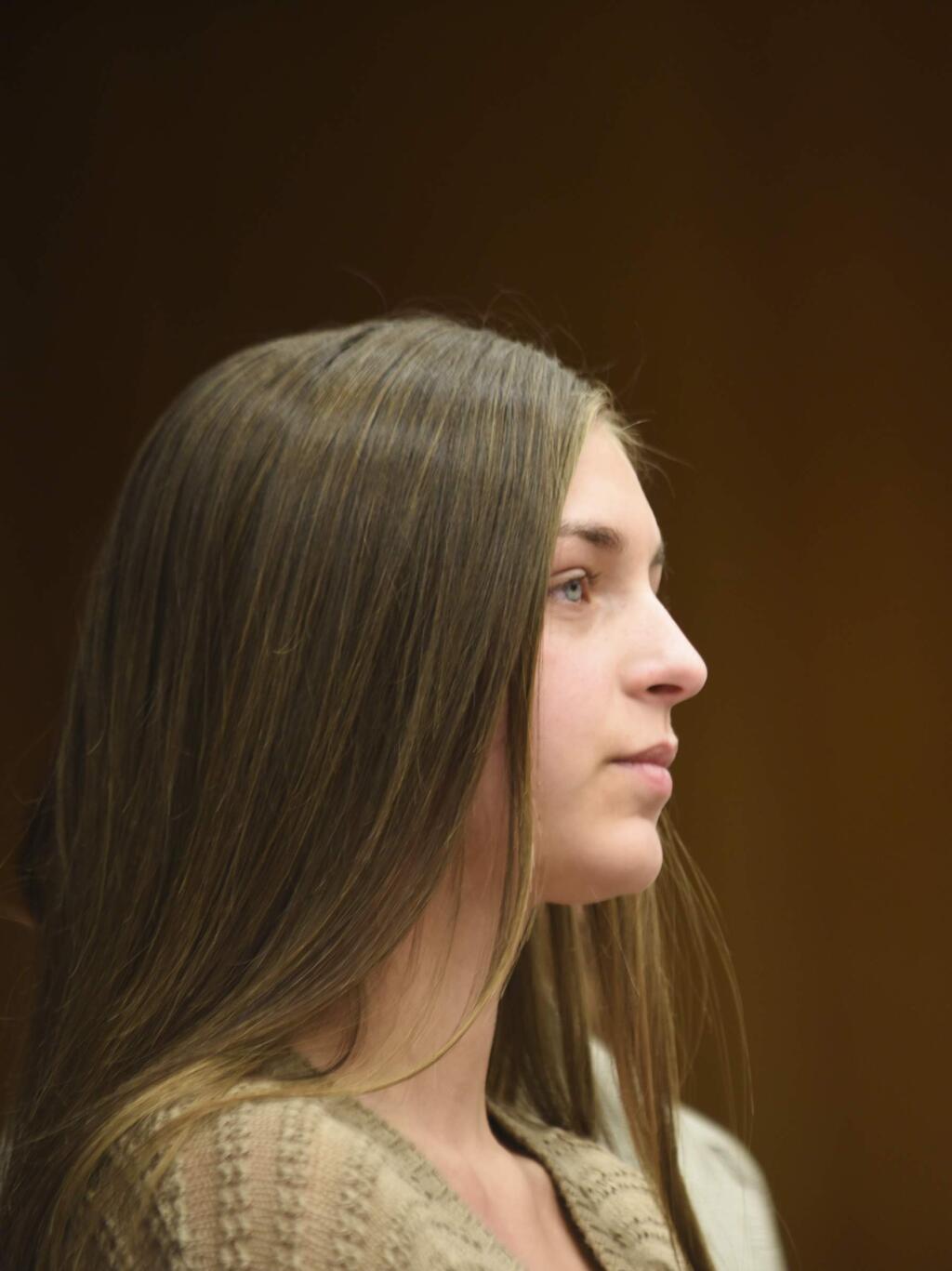 Mya Covey, a minor, gives her victim impact statement Wednesday, Jan. 31, 2018, during the first day of statements in Eaton County Circuit Court in Charlotte, Mich., where Nassar is expected to be sentenced on three counts of sexual assault some time next week. (Matthew Dae Smith /Lansing State Journal via AP)