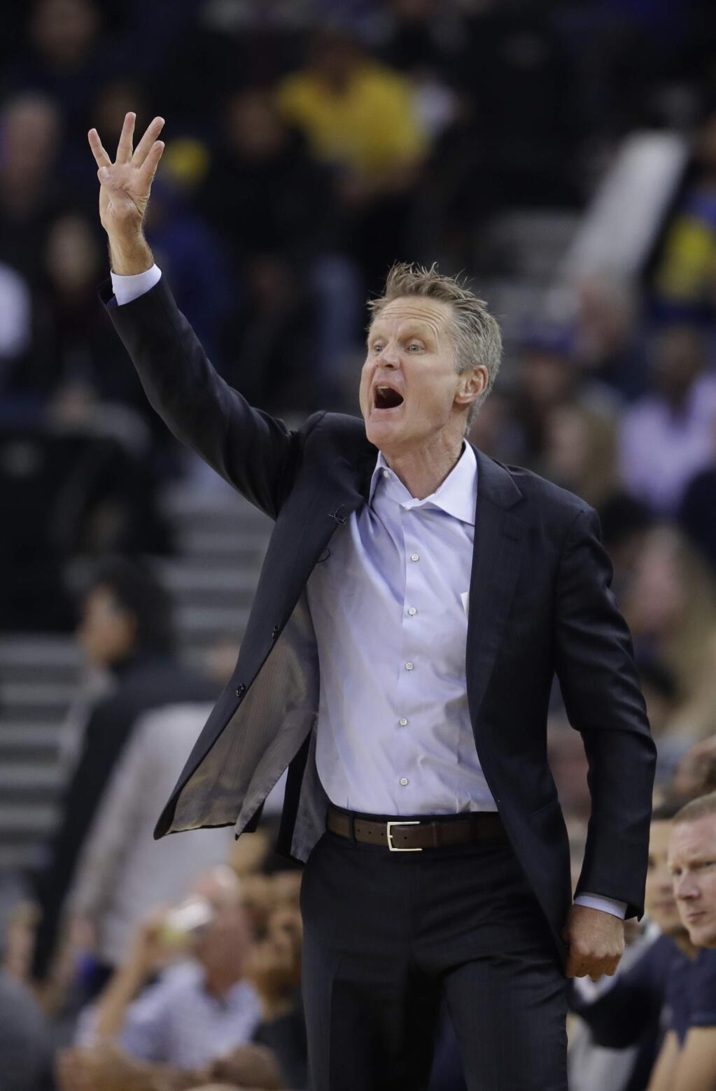 Golden State Warriors coach Steve Kerr yells from the bench during the first half against the Los Angeles Clippers on Thursday, Feb. 22, 2018, in Oakland. (AP Photo/Marcio Jose Sanchez)