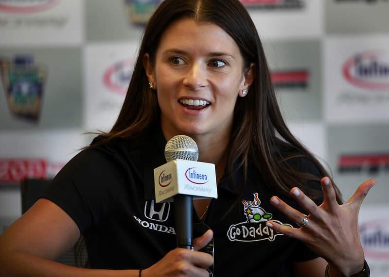 Danica Patrick talks to the press about her jump to NASCAR at Infineon Raceway in Sonoma in 2011. She owns Somnium Wines, based in Calistoga. (Kent Porter / The Press Democrat file)
