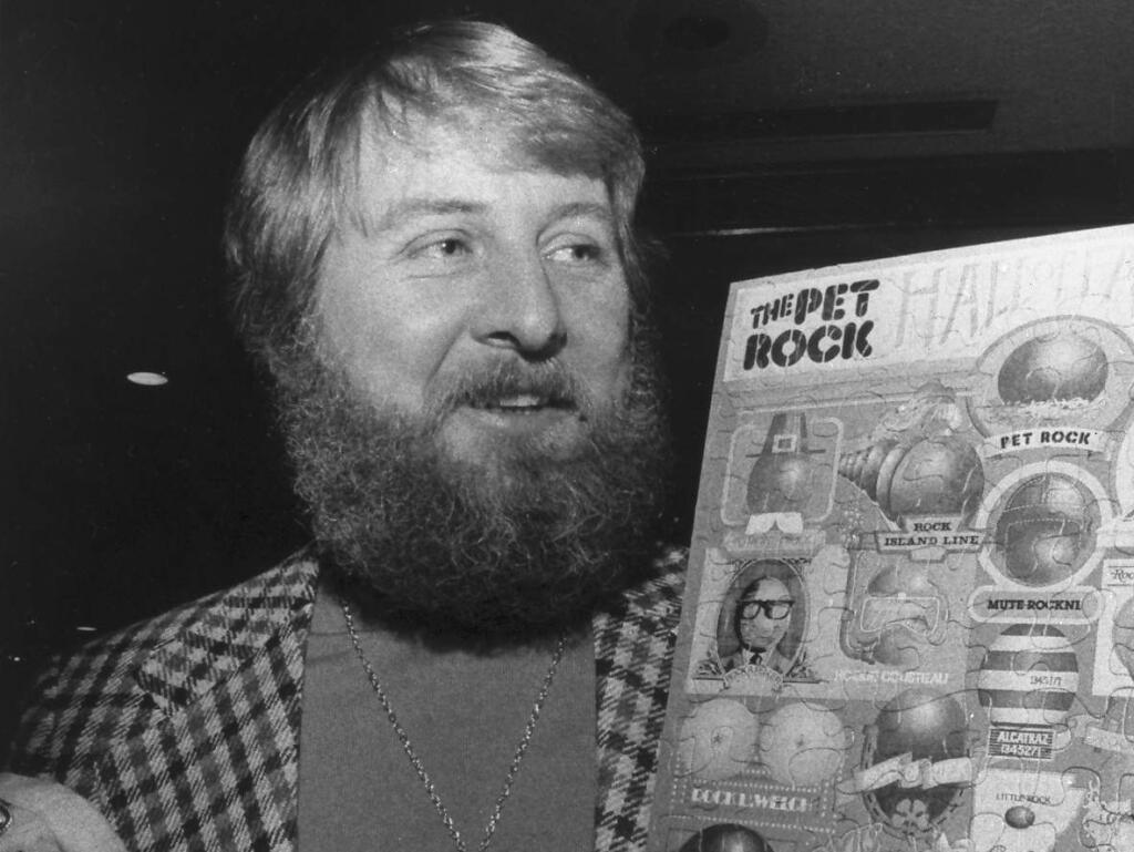 Gary Dahl, originator of the Pet Rock, holds Pet Rock items in 1976. Gary Ross Dahl, the creator of the wildly popular 1970s fad the Pet Rock, has died at age 78 in southern Oregon. Dahl's wife, Marguerite Dahl, confirmed Tuesday March 31, 2015 that her husband of 40 years died March 23 of chronic obstructive pulmonary disease. (AP Photo/San Francisco Chronicle, File)