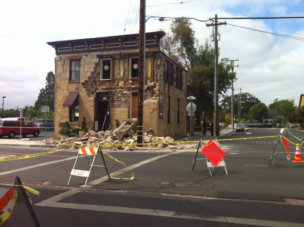 A building on Napa's Main Street that was damaged in the Aug. 24 earthquake. Photo taken Monday, Aug. 25, 2014. (BETH SCHLANKER / PD)
