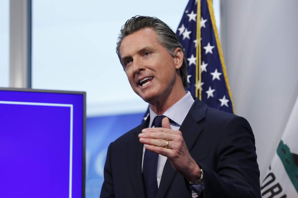 FILE - In this file photo taken Tuesday April 14, 2020, California Gov. Gavin Newsom discusses an outline for what it will take to lift coronavirus restrictions during a news conference at the Governor's Office of Emergency Services in Rancho Cordova, Calif. (AP Photo/Rich Pedroncelli,File)
