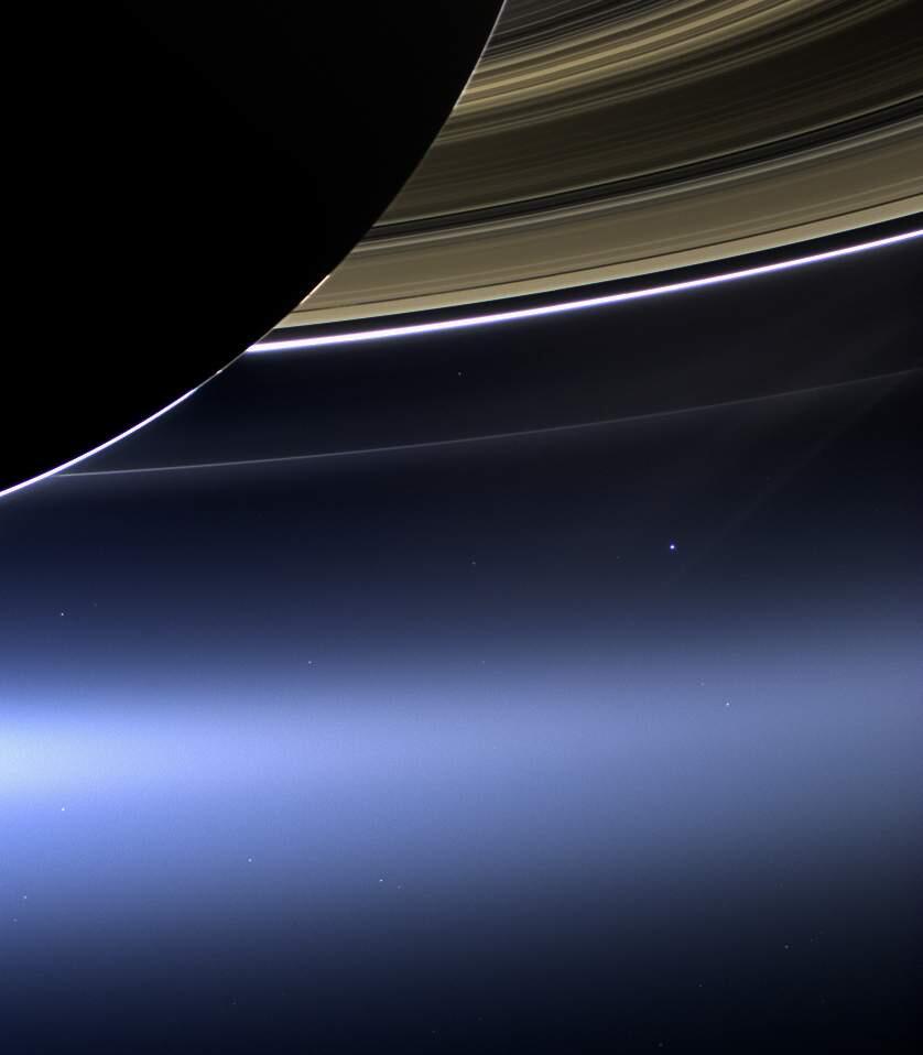This July 19, 2013 NASA image shows Saturn's rings and Earth as seen from the Cassini spacecraft. (NASA)