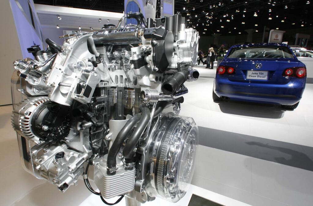 FILE - In this Nov. 20, 2008 file photo a Volkswagen Jetta TDI diesel engine is displayed at the Los Angeles Auto Show. Green Car Journal named Volkswagen's 2009 Jetta TDI as the 'Green Car of the Year' at the show on Thursday, making it the first clean-diesel vehicle to win the prize. Around 15 billion euros (US$ 16.9 billion) was wiped off the market value of Volkswagen AG on Monday, Sept. 21, 2015 following revelations that the German carmaker rigged U.S. emissions tests for about 500,000 diesel cars. (AP Photo/Damian Dovarganes)