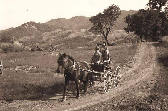 John McCormick drives his daughters, Babe and Ina down the mountain, probably in the late 1920s. (Jim Perry via Sonoma Land Trust)