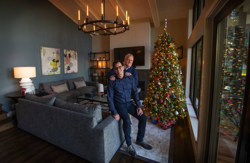 Peter Lasalle and Mark Ritter bought their home in Montecito Heights just four days after they lost their home in the Tubbs Fire in October, 2017. A year later they have completed their remodel complete with a Christmas tree. (photo by John Burgess/The Press Democrat)