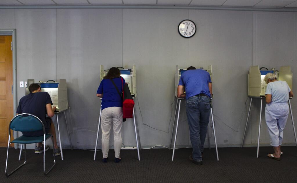 Polling places throughout Petaluma had a steady stream of voters on Election Day.  (CRISTINA PASCUAL/ARGUS-COURIER STAFF)
