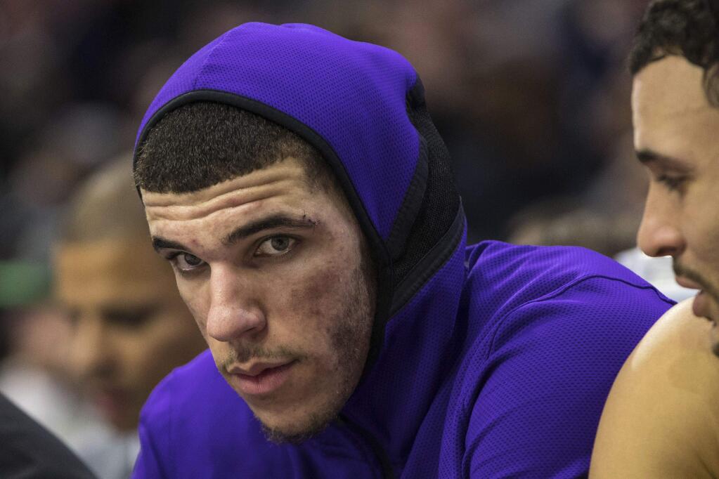 The Los Angeles Lakers' Lonzo Ball looks on during the second half against the Philadelphia 76ers, Thursday, Dec. 7, 2017, in Philadelphia. The Lakers won 107-104. (AP Photo/Chris Szagola)