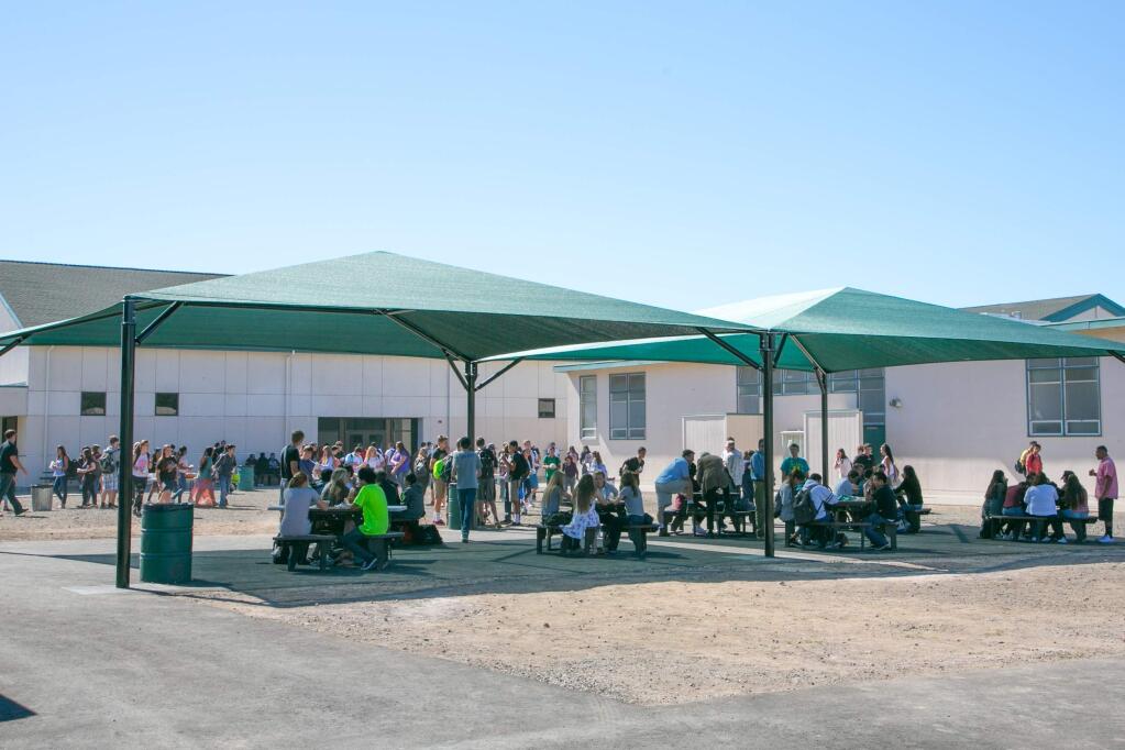 New structures on the Sonoma Valley High campus throw a little shade on students enjoying lunch. (Photo by Julie Vader/Special to the Index-Tribune)