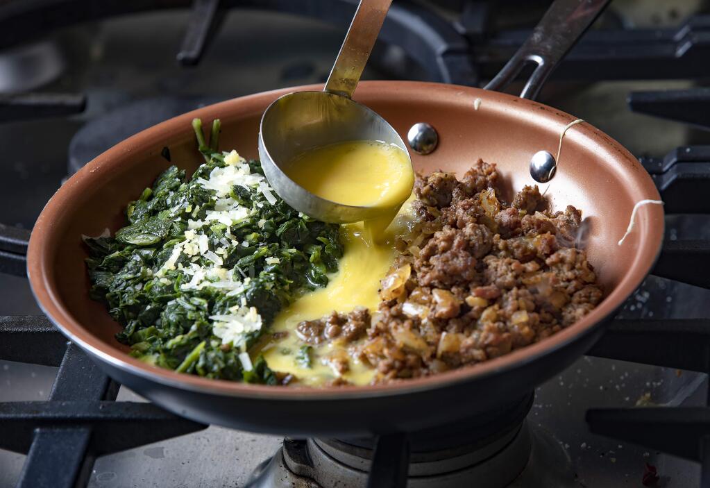Joe's Special with ground beef, spinach and eggs originated in San Francisco in the 1920s. (John Burgess/The Press Democrat)
