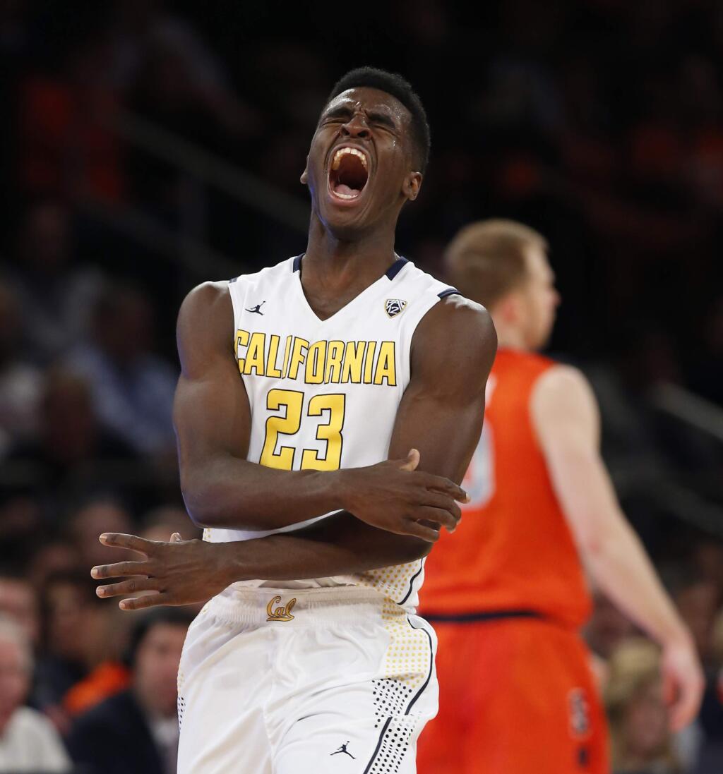 California guard Jabari Bird (23) reacts after hitting a three-point shot against Syracuse in the first half of a game at Madison Square Garden in New York, Thursday, Nov. 20, 2014. (AP Photo/Kathy Willens)