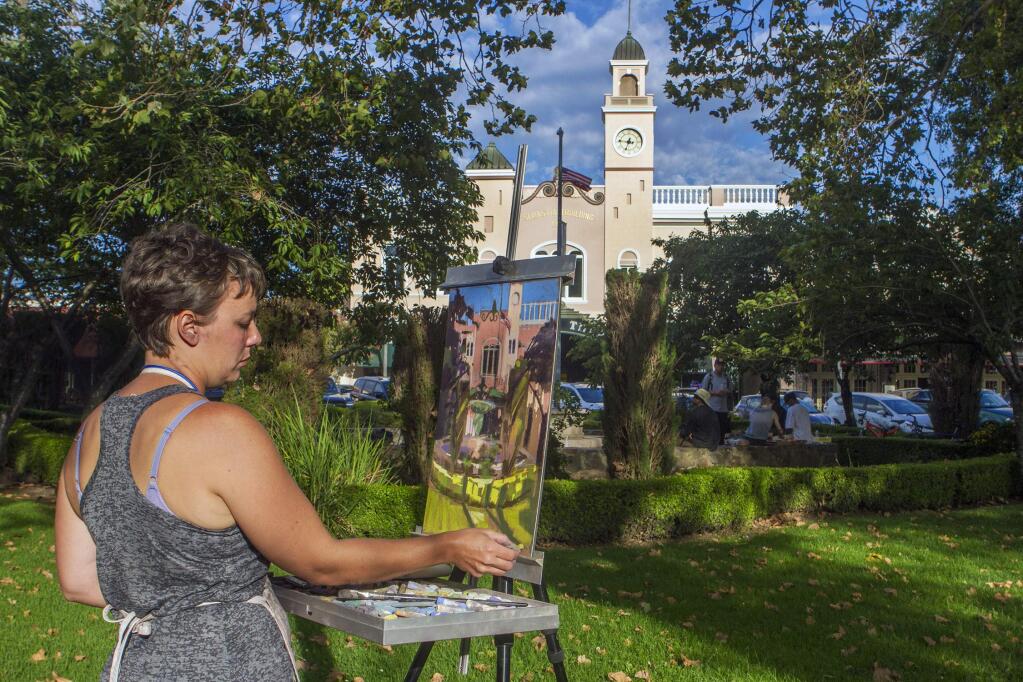 Using pastels, Tara Will, from Maryland, worked on her image of the Sebastiani Theatre. The 'Quickdraw' part of the Plein Air event places Tuesday on the Plaza. Artists are given an hour-and-a-half to complete their paintings, which are then put on display and sold. (Photo by Robbi Pengelly/Index-Tribune) File photo.