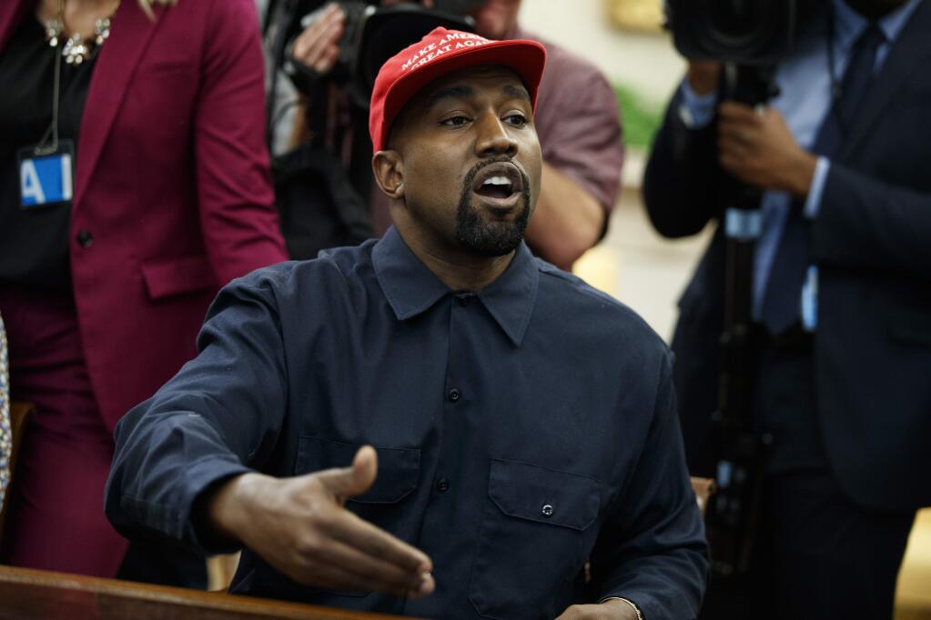 Rapper Kanye West speaks during a meeting in the Oval Office of the White House with President Donald Trump, Thursday, Oct. 11, 2018, in Washington. (AP Photo/Evan Vucci)
