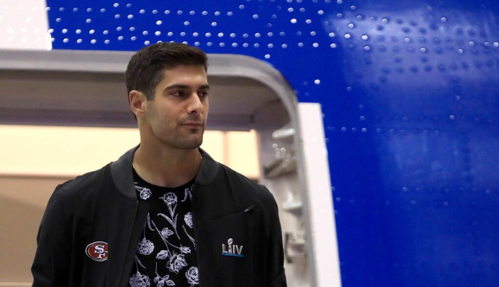 San Francisco 49ers quarterback Jimmy Garoppolo steps off the plane as the 49ers charter arrives at Miami International Airport, Sunday, Jan. 26, 2020, in preparation for Super Bowl LIV. (Kent Porter / The Press Democrat) 2020