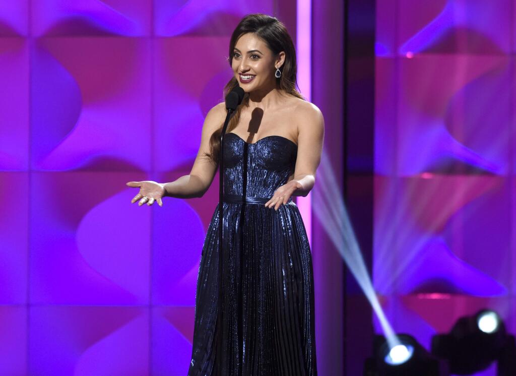 Francia Raisa presents the award for woman of the year at the Billboard Women in Music event at the Ray Dolby Ballroom on Thursday, Nov. 30, 2017, in Los Angeles. (Photo by Chris Pizzello/Invision/AP)