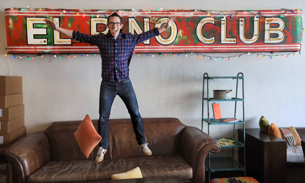 Baron Ziegler, CEO of Banshee Wines, Thursday March 8, 2018 in Healdsburg. The 'El Pino Club” sign was picked up at a flea market in Alameda County and adds to the hipster feel of the winery. (Kent Porter / Press Democrat) 2018