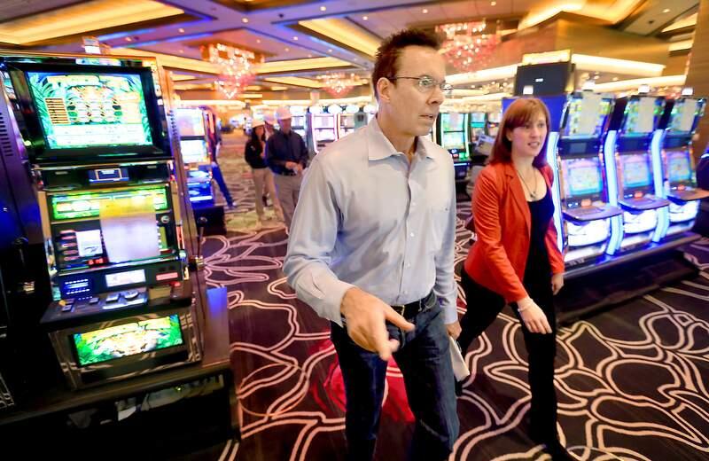Greg Sarris, chairman of Federated Indians of Graton Rancheria and Lori Nelson, vice president of communications for Station Casinos, tour the Graton Resort and Casino, Wednesday Oct. 2, 2013 in Rohnert Park. (Kent Porter / Press Democrat, 2013)
