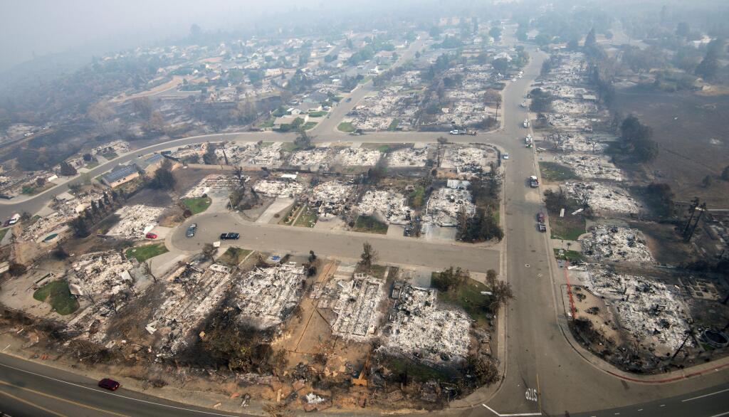 An aerial photo shows homes in Redding destroyed by the Carr fire. (MICHAEL BURKE / Associated Press)