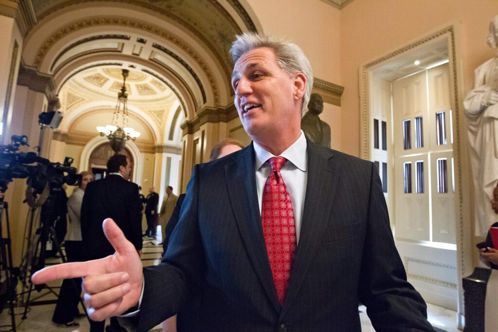 FILE - In this July 11, 2012 file photo, then-House Majority Whip Kevin McCarthy of Calif., leaves the House chamber on Capitol Hill in Washington after the Republican-controlled House voted to repeal President Barack Obama's health care law. (AP Photo/J. Scott Applewhite, File)