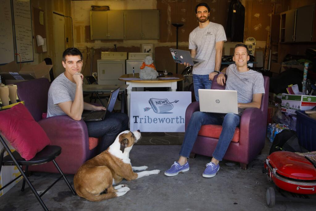 Petaluma, CA, USA. Tuesday, June 20, 2017._The founders of Tribeworthy, (left to right): Austin Walter, Chase Palmieri and Jared Fesler work in the garage of their apartment in Petaluma, where Jared's dog, Colin, keeps an eye on them. (CRISSY PASCUAL/ARGUS-COURIER STAFF)