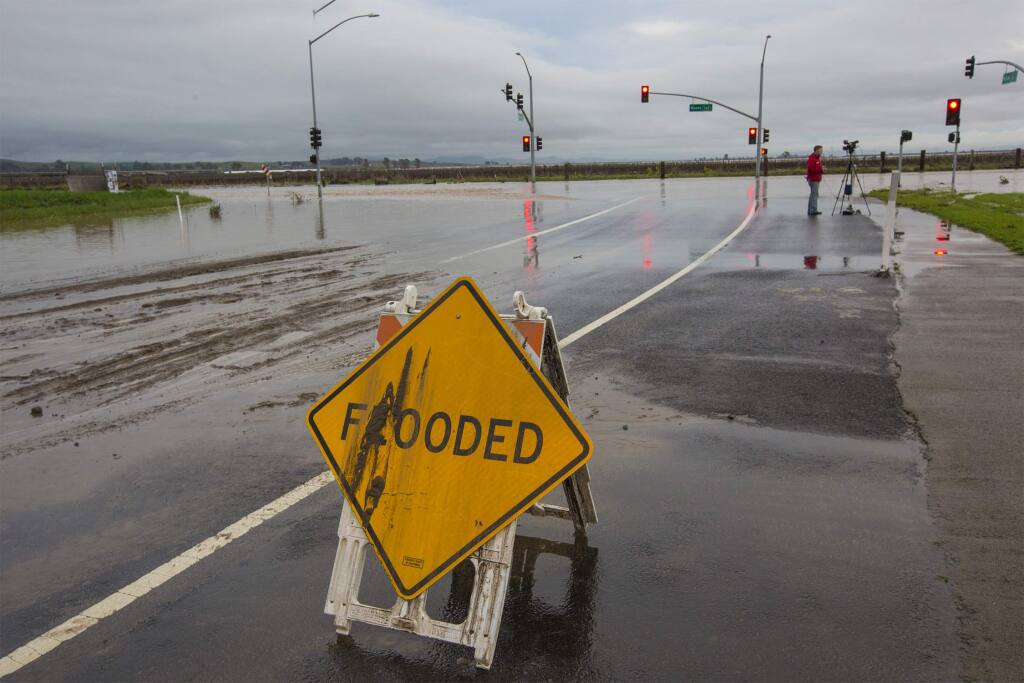Friday's rainfall will break Santa Rosa's record for most rainfall in a recorded season. Scroll through the gallery to see photos from recent and previous storms. Here, the intersection of Highway 121 and Broadway in the Sonoma Valley flooded during a storm in January 2017. (Photo by Robbi Pengelly/Index-Tribune)