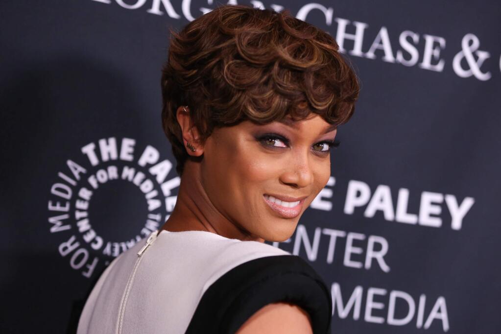 FILE - In this Oct. 26, 2015 file photo, Tyra Banks arrives at Media's Tribute to African-American Achievements in Television at the Beverly Wilshire Hotel in Beverly Hills, Calif. Banks is trading the catwalk for the classroom. The former host of 'America's Next Top Model' and 'FABLife' will teach students at Stanford University in May 2017. (Photo by Rich Fury/Invision/AP, File)