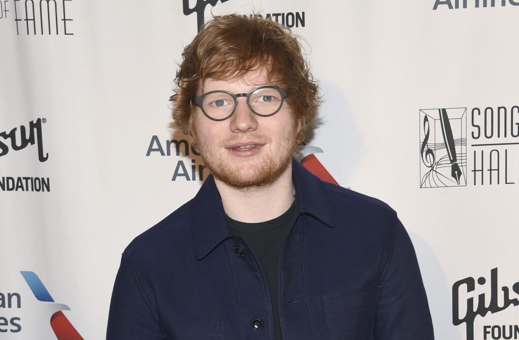 FILE - In this June 15, 2017, file photo, Ed Sheeran attends the the 48th Annual Songwriters Hall of Fame Induction and Awards Gala at the New York Marriott Marquis Hotel in New York. Sheeran posted an on-set picture on July 16, 2017, following his ‚ÄòGame of Thrones‚Äô cameo in which the 26-year-old British singer appeared as a Lannister soldier in the season premiere of the hit HBO fantasy drama, which debuted on the premium cable channel Sunday night. (Photo by Evan Agostini/Invision/AP, File)