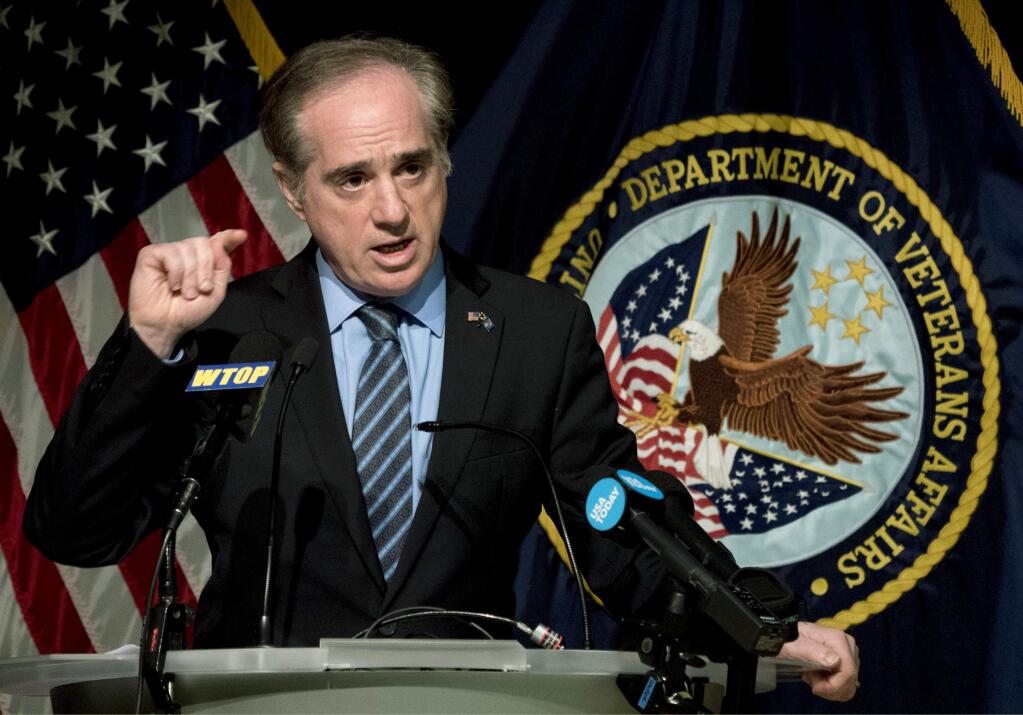 ALTERNATE CROP OF DCAH102 - Veterans Affairs Secretary David Shulkin speaks at a news conference at the Washington Veterans Affairs Medical Center in Washington, Wednesday, March 7, 2018, in response to a VA inspector general audit being released today. A new government investigation finds that Shulkin took no action to fix longstanding problems of dirty syringes and equipment shortages that put patients at risk at a major veterans hospital when he was undersecretary of health under the Obama administration, saying he was never told of problems reported to the VA offices under his watch. The harsh report by the VA inspector general cites 'failed leadership' and a 'climate of complacency' for patient safety issues dating back to 2013 and cautions of continuing problems without strong oversight. (AP Photo/Andrew Harnik)