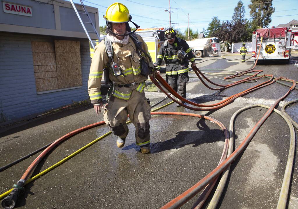 Petaluma, CA, USA._Thursday, July 18, 2019._Firefighters from throughout Petaluma and nearby participated in a training with the rare opportunity to practice on fires in an existing structure to simulate several scenarios. (CRISSY PASCUAL/ARGUS-COURIER STAFF)