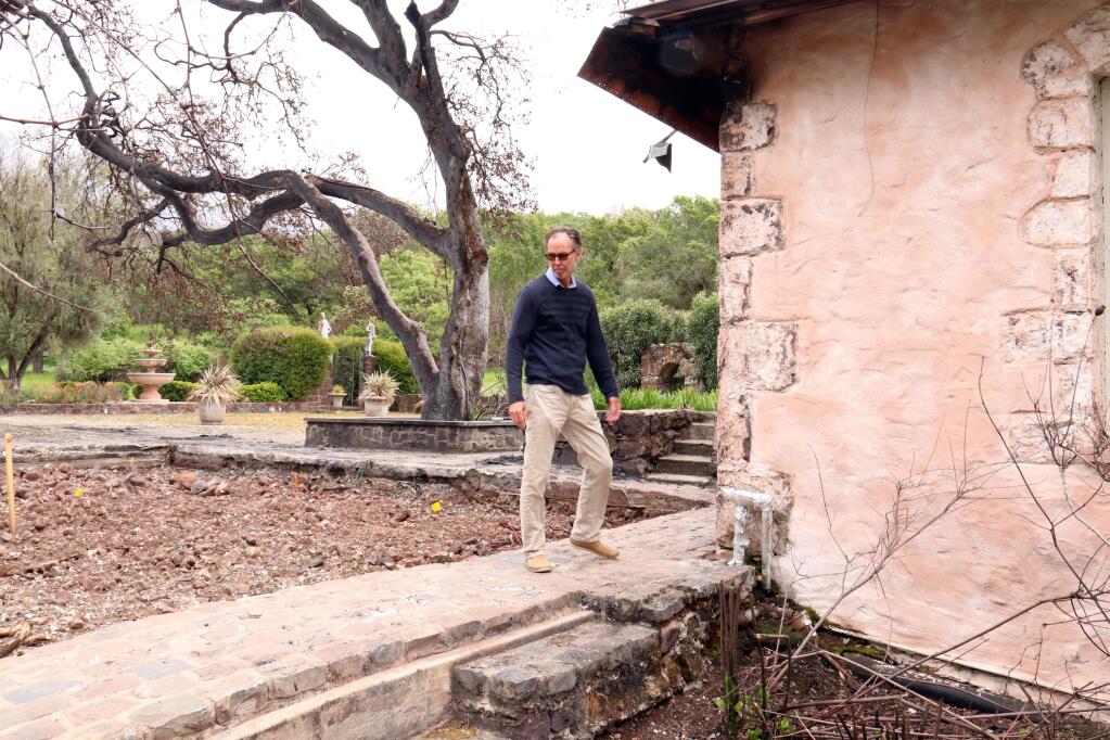 Bouverie Preserve's director John Petersen at the former home of David Bouverie, one of only two buildings left standing on the 535-acre property in the wake of October's fires. (Christian Kallen/Index-Tribune)