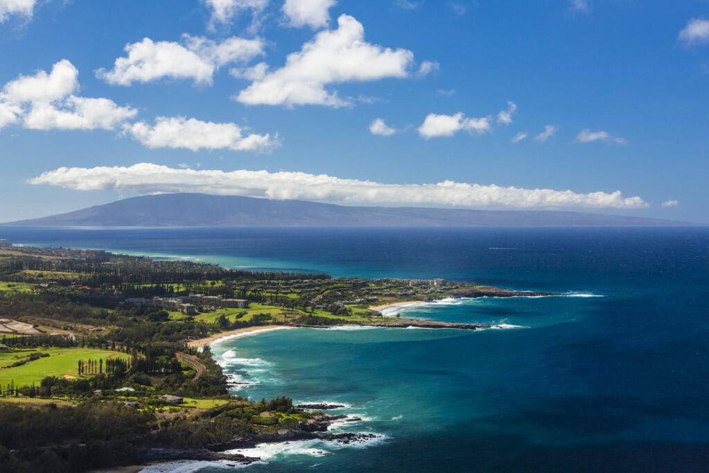 This undated photo provided by the Hawaii Tourism Authority shows a view of the Kapalua coastline in Maui, Hawaii. Kapalua Bay Beach is No. 2 on the list of best beaches for the summer of 2017 compiled by Stephen Leatherman, also known as Dr. Beach, a professor at Florida International University. (Tor Johnson/Hawaii Tourism Authority via AP)